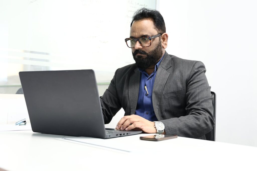 Professional editing profile on laptop with focused and structured approach